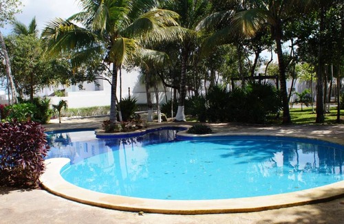 Puerto Juarez House | La Casa del Mexicano terraza y jardin exoticos 12 min del playa Esmeralda