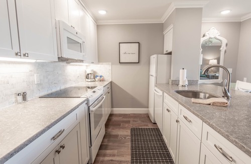 Boyne City Condo | Lake Charlevoix Views | Private Patio | Steps to Sand & Shoreline |