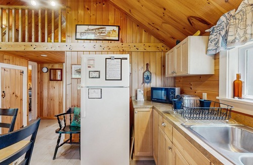 Greenville Cottage | Lakefront, cabin-inspired home with firepit, grill, & screened porch, Wifi