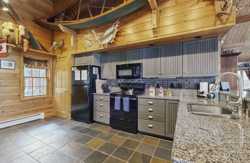 Greenville Junction House | Lakeside Lodge with Amazing Water Views, Screened Porch, Dock, & Firepit