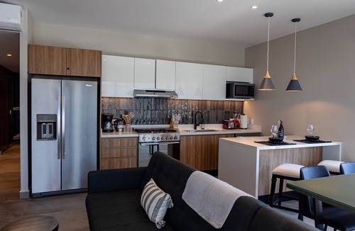 El Caloso Condo | Large Corner Balcony | Bar, Gym, in Romantic Zone