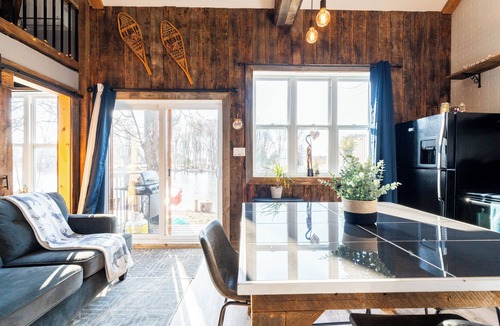 Pike River Cabin | Le Héron Eco-Rustic Chalet with Waterfront Terrace and Spa