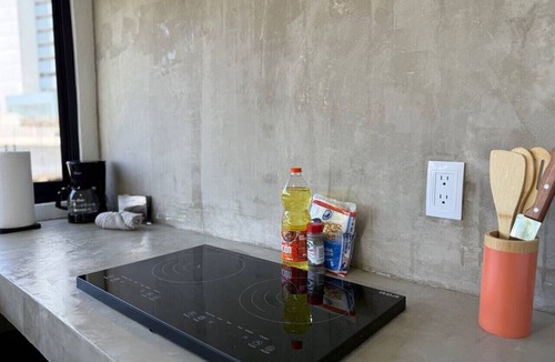 Zona Dorada Apartment | Loft Steps from the Beach By PartnerHostRentas