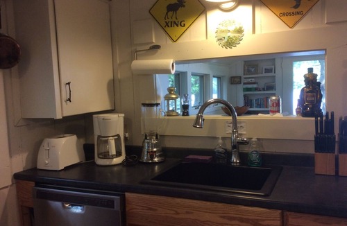 Oquossoc House | Loon Camps at Waters Edge - Two cute cottages are connected by a screened porch