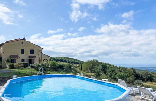 Castellina Marittima Apartment | Lovely apartment for 17 people with A/C, pool, WIFI, TV, patio, pets allowed and panoramic view