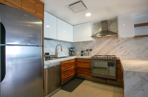 South Hotel Zone Condo | Luxurious, Beachfront 2bed/2 bath Condo with Designer Finishes