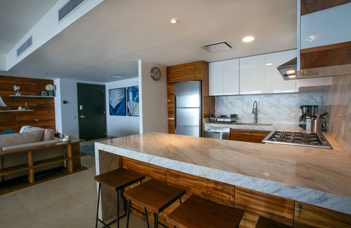 South Hotel Zone Condo | Luxurious, Beachfront 2bed/2 bath Condo with Designer Finishes