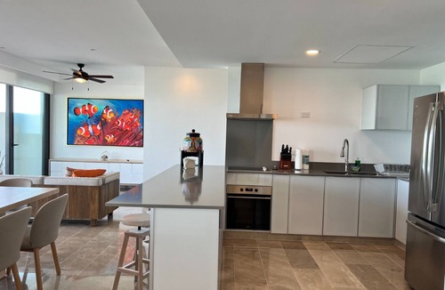 Dzemul Condo | Luxury beachfront condo w/private jacuzzi