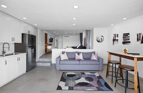 Fluvial Vallarta Condo | Luxury High Rise Condo just Steps Away from the Beach!
