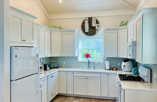 Lubbers Quarters Cay House | Luxury oceanfront 4BR · 2 protected docks · private gated compound