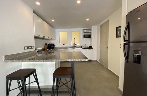 Brisas del Marques Condo | Magical sunsets, king bed, and pro service B403