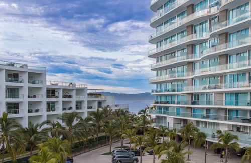 Flamingos Apartment | Marítima Beachfront Condo: 2 Pools, Gym, Balconies