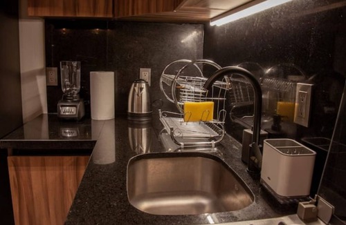 Colonia Cuauhtemoc Apartment | Mid-Century's Morning Embrace: Revel in 'Nowness' Amidst Roma's Radiance.n