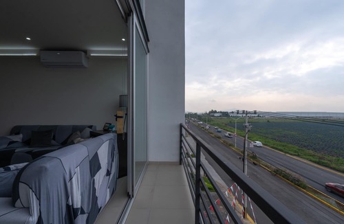 Tlajomulco de Zuniga Apartment | Modern Apartment with Terrace and Pool Access