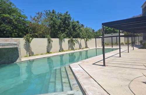 P Chahue Apartment | Modern Apt with Pool - 5 Min walk to Chahue Beach