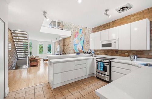Garden District Apartment | Modern, Spacious 2 level in Downtown Historic Building - FIFA Ready!