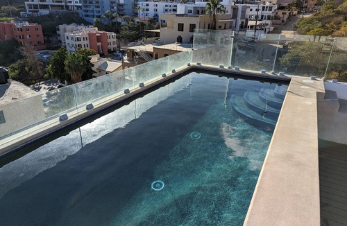 Libertad Condo | Modern, spacious condo w/pool. Close to Downtown.