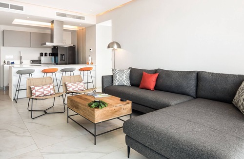 Isla Iguana Apartment | Modern, water & mountain view condo with huge balcony, rooftop pool, gym, & spa