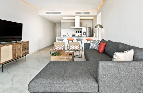 Isla Iguana Apartment | Modern, water & mountain view condo with huge balcony, rooftop pool, gym, & spa