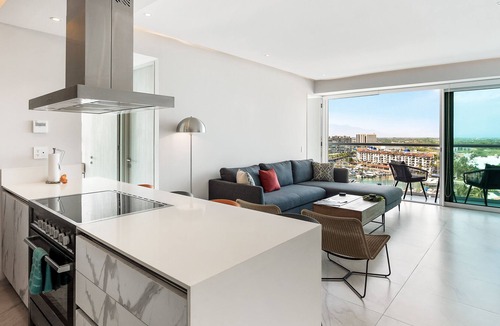 Isla Iguana Apartment | Modern, water & mountain view condo with huge balcony, rooftop pool, gym, & spa