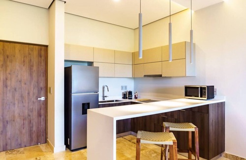 Playa Paraiso Apartment | New 2Bdr unit step away from the Caribbean beaches