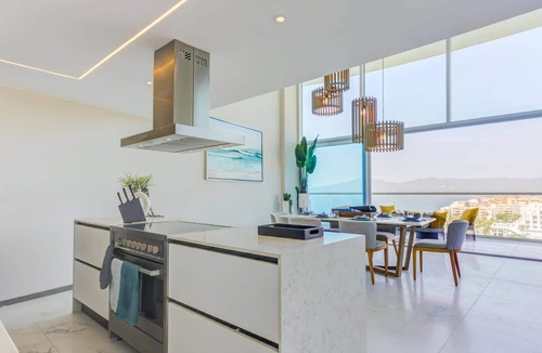 Flamingos Apartment | NEW Beachfront Marítima Penthouse with 2 Pools and Gym