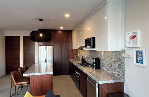 Libertad Condo | New! Slick designer apARTtment with bay views.