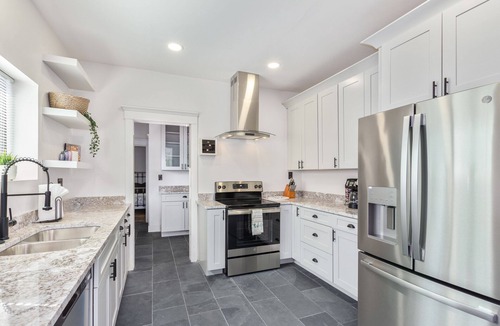 Sam Hughes House | Newly updated charming house with resort-style amenities and centrally located!