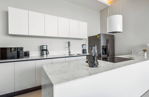 Flamingos Condo | Ocean-view 5th-floor condo with 4 pools, sauna, steam room, huge balcony, & gym