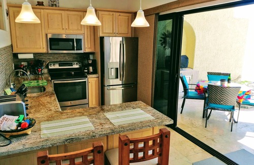 Cabo Bello Condo | OCEANFRONT GROUND FLOOR 2 BEDROOM END UNIT INDOOR/OUTDOOR LIVING AT IT'S BEST