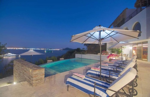 Peninsulas de Santiago Villa | Oceanfront Villa Located in Upscale Community