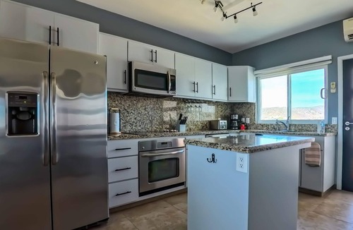 La Paz Apartment | Oceanview Getaway with Balcony, Pool & BBQ Access