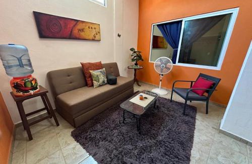Colonia 5 de Diciembre Apartment | Orange Butterfly