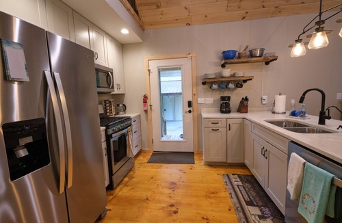 Mears House | Our Neck of the Woods, Mears. A Modern Rustic Feel that is EV-friendly.