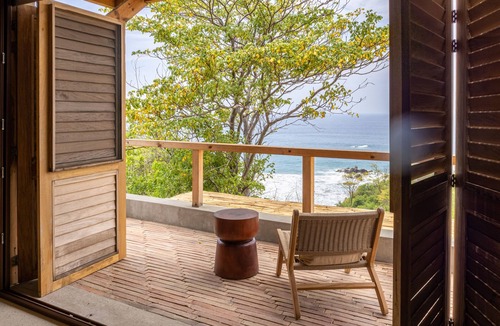 San Agustinillo Villa | Peaceful oceanview retreat with 2 king suites, private pool & lush gardens