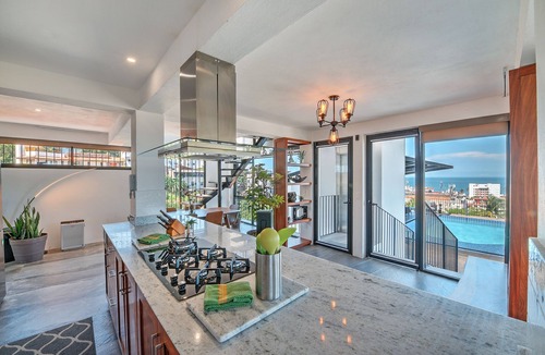 Colonia 5 de Diciembre Condo | Penthouse Condo with Private Rooftop Terrace. Short walk to the Beach & Malecón.