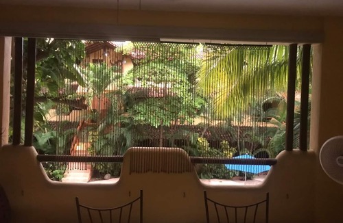 Queretaro Condo | Private Tropical Oasis Steps From the Beach, Dining and Shopping
