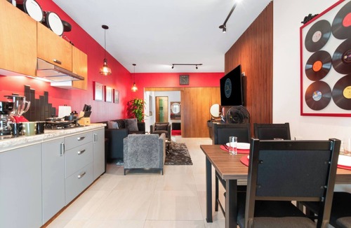 Durango Apartment | Red Vibe Music Decor | King Bed + Parking + Office