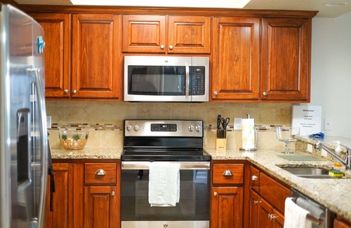 New Smyrna Beach Condo | Resort style amenities in spacious condo with beach access and direct pool view.