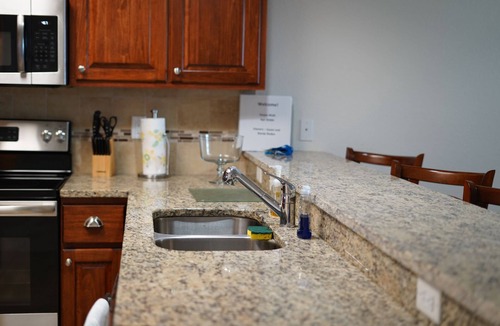 New Smyrna Beach Condo | Resort style amenities in spacious condo with beach access and direct pool view.