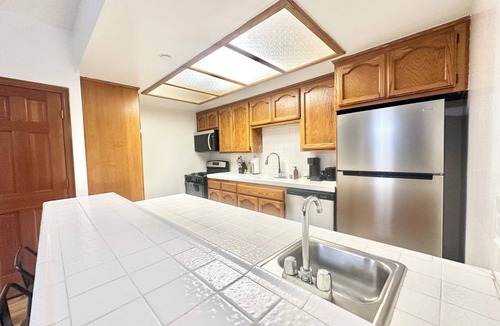 Fountain Valley Condo | Resort Style Stay near Beaches, Disneyland, Los Angeles & more