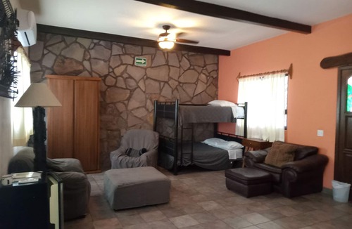 La Ribera Bed & Breakfast | Room #6 Master with one king size bed, one double bed & one double bunk bed