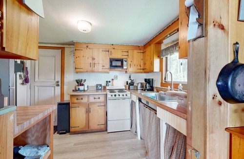 Palermo House | Rustic dog-friendly waterfront home with screened porch, dock, firepit, 2 kayaks