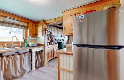 Palermo House | Rustic dog-friendly waterfront home with screened porch, dock, firepit, 2 kayaks