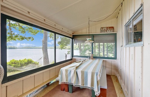 Palermo House | Rustic dog-friendly waterfront home with screened porch, dock, firepit, 2 kayaks