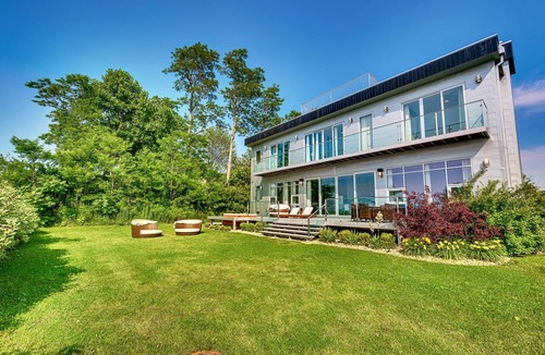 Riverside Villa | Sandy Shores: Stunning Modern Beach House with Sunset views over Lake Michigan