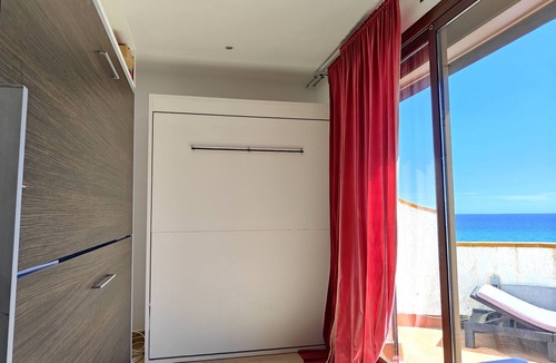 Sitges Apartment | Sitges. Mediterranean Balcony. Amazing views. Beach and pool. A/C. Parking. WIFI