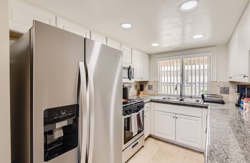 East Side Costa Mesa Apartment | Spacious 3BR Yard BBQ Games Free Parking 0R2