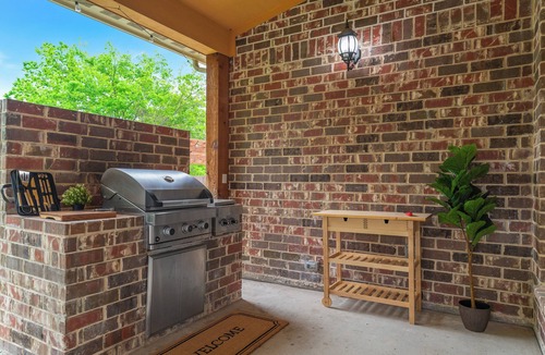 Irving House | Spacious 4-bedroom house near DFW, Hot Tub, Game Room, Backyard Playset