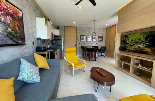 Lazaro Cardenas Condo | Stunning sunset view from the rooftop infinity pool. 5 min walk to the beach.